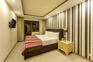 Отель Regnum Bansko Ski Hotel & SPA Банско Люкс с кроватью размера «king-size»-4